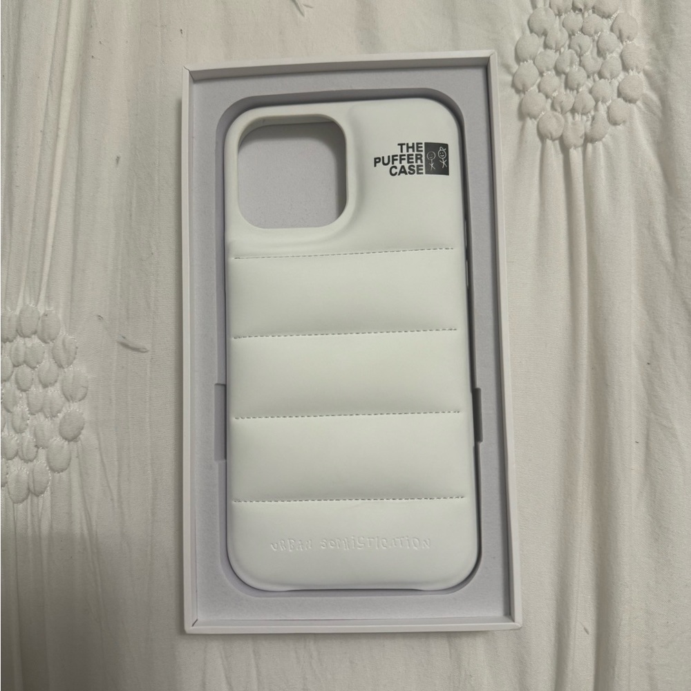 I phone 13 Pro Max Urban Sophistication white puffer phone case.